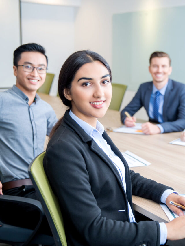 smiling-business-lady-working-with-colleagues